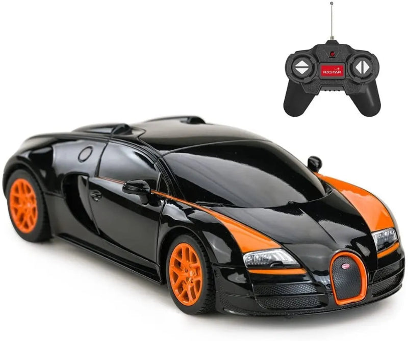 Black and orange toy car with remote control on a white background