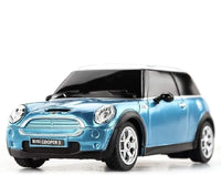 Model of a blue Mini Cooper S car on a white background