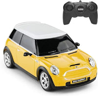Yellow toy car with white roof and remote control on a white background