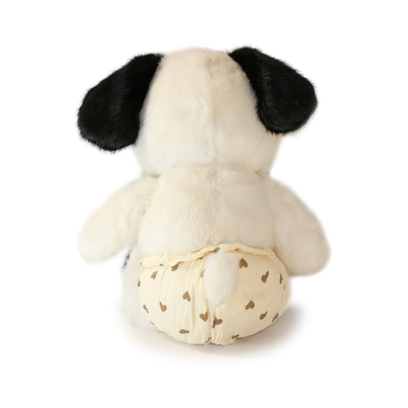 White plush dog toy with black ears on a white background