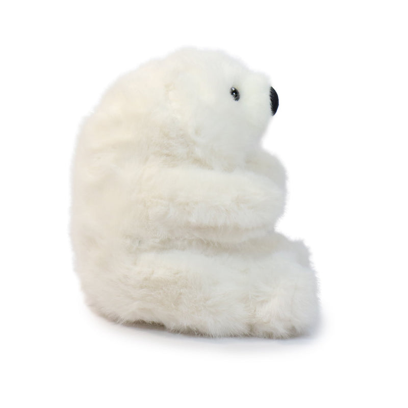 White plush polar bear toy on a white background
