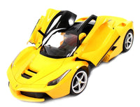 Yellow toy sports car with open doors on a white background
