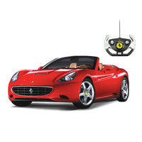 Red toy sports car with remote control on a white background