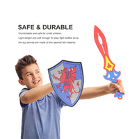 Boy playing with a sword and shield playset featuring a red dragon design. Perfect for pretend battles and role-play