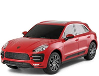 Red Porsche SUV on a white background