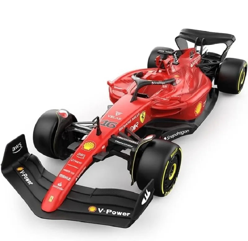 Red Formula 1 car with black and yellow details on a white background
