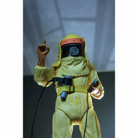 Figure in a yellow hazmat suit with a black helmet against a gray background