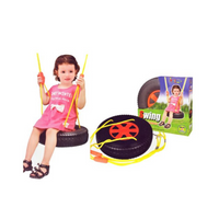 A girl playing with Tire Swing Play Set