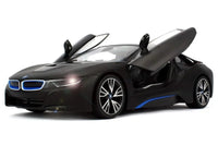 Black BMW i8 sports car with open doors on a white background