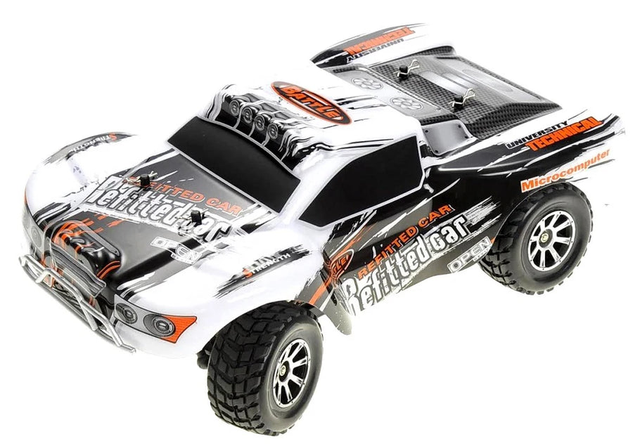 White and black remote control car with orange accents on a white background