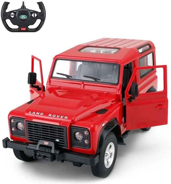 Red Land Rover model with a remote control steering wheel on a white background