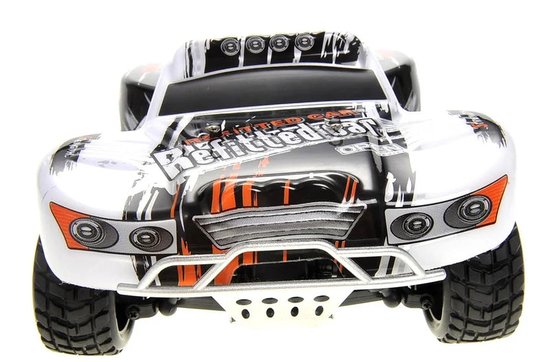 White remote control car with black and orange details on a white background