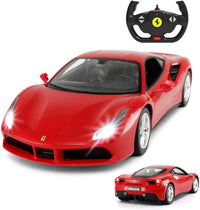 Red toy Ferrari car with remote control on a white background