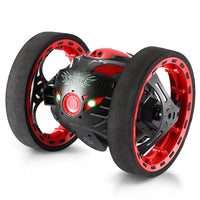 Black and red robot toy with wheels on a white background
