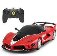 Red toy car with black and white details and a remote control on a white background