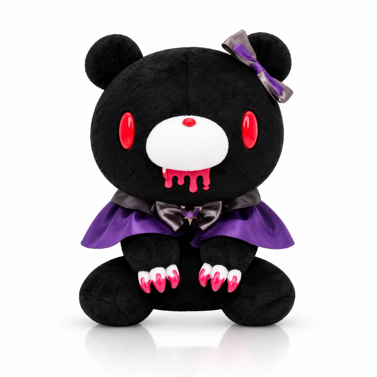 Black plush toy with pink accents and a purple bow on a white background