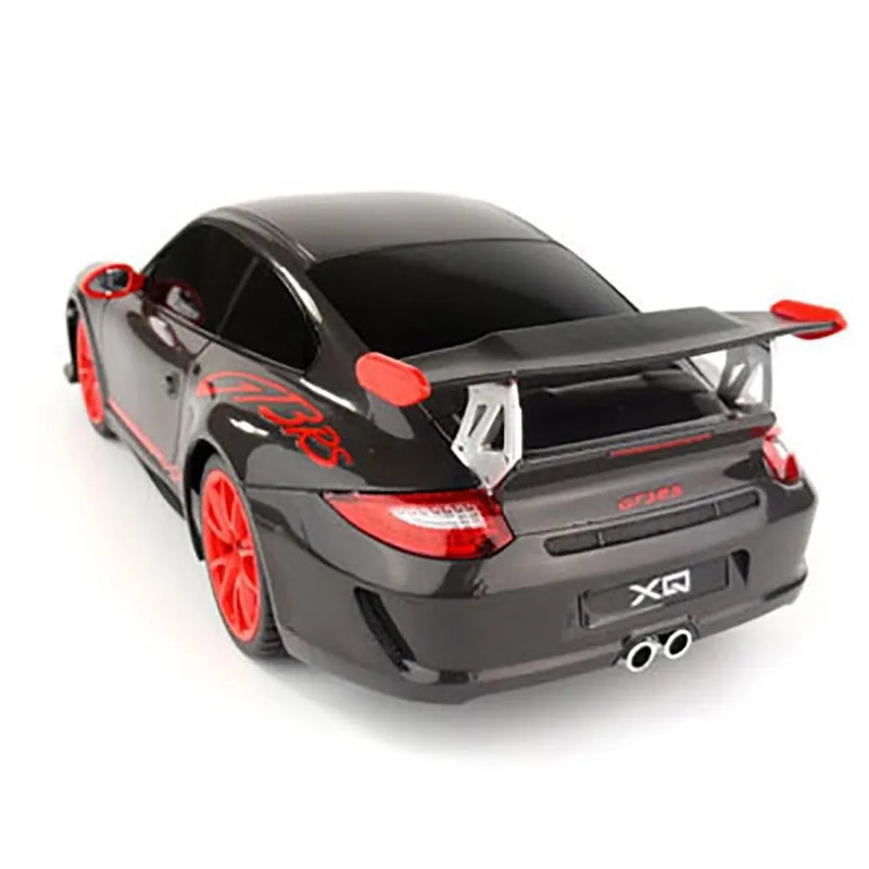 Black and red model car on a white background