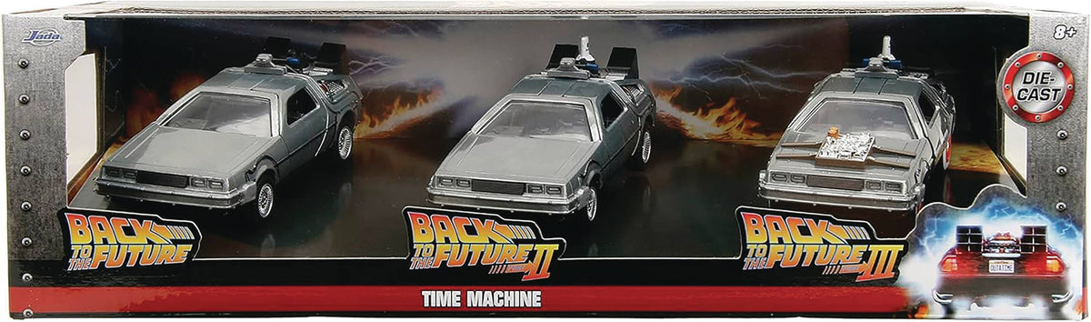 Three DeLorean time machines from Back to the Future movie series in a box with promotional graphics.