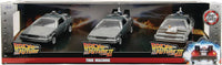 Three DeLorean time machines from Back to the Future movie series in a box with promotional graphics.