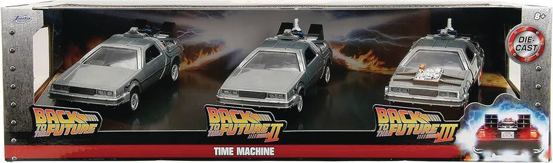 Three DeLorean time machines from Back to the Future movie series in a box with promotional graphics.