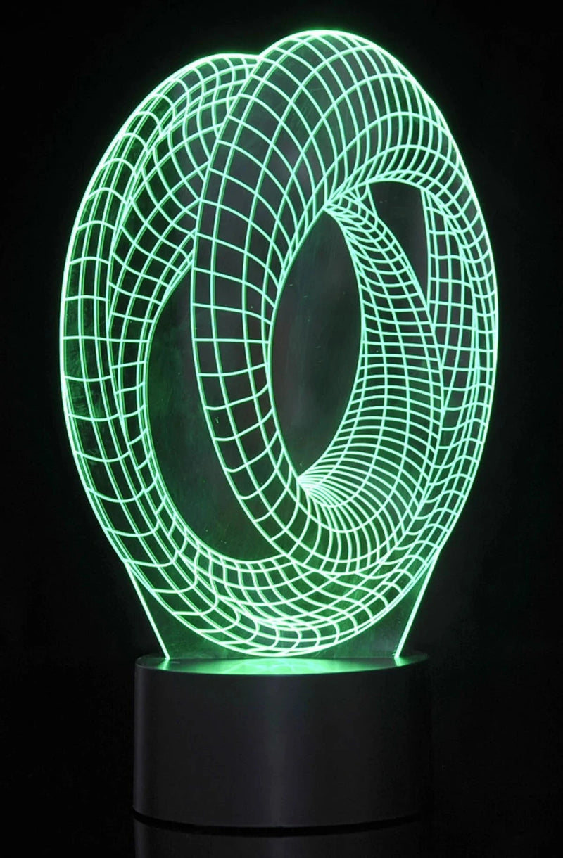 Slim side view of the 3D illusion lamp illuminated in green, highlighting its sleek and modern design.