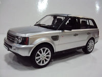 Silver Land Rover Range Rover on a white background