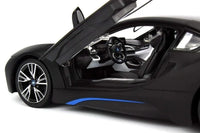 Black futuristic car with open door on a white background