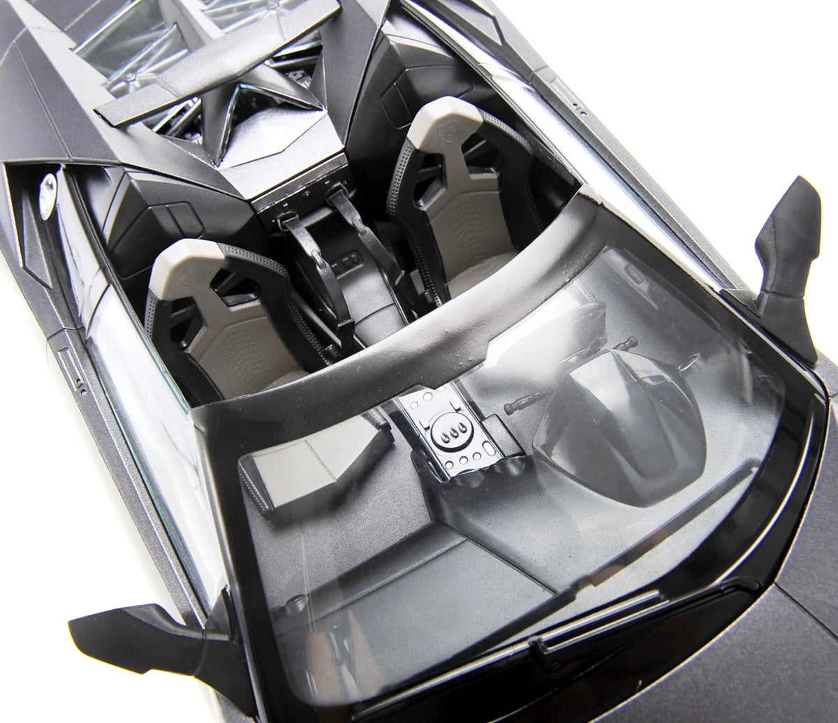 Close-up of a car's interior with a focus on the steering wheel and dashboard.