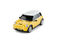 Yellow toy car with a white roof on a white background