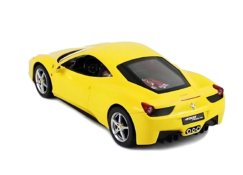 Yellow toy car with a Ferrari logo on a white background