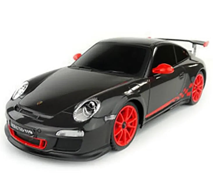 Black toy car with red accents on a white background