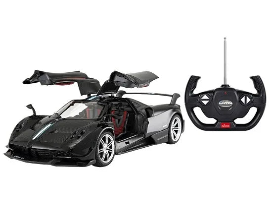 Black toy car with open doors and a remote control on a white background