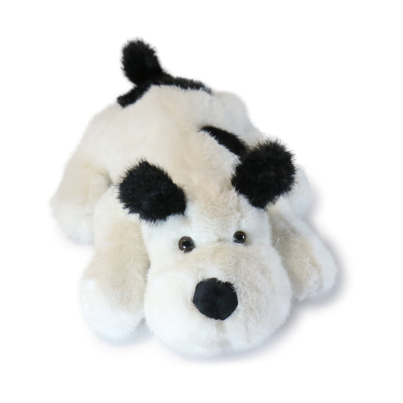 Plush dog toy with black and brown fur on a white background