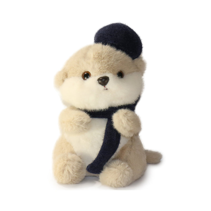 Plush toy dog with a navy blue hat and scarf on a white background