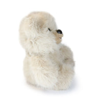 Plush toy of a polar bear on a white background