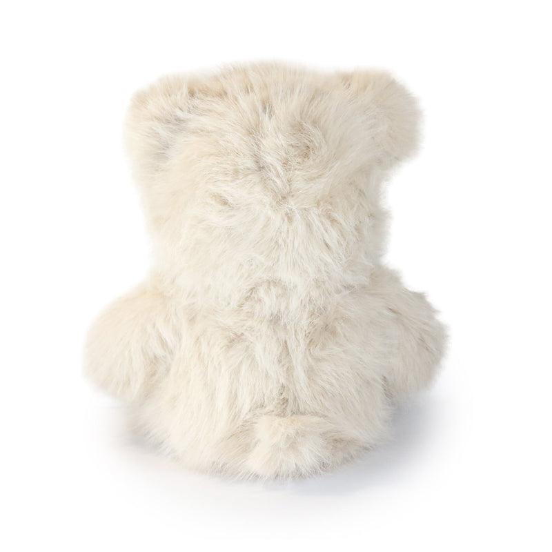 Fluffy white bear on a white background