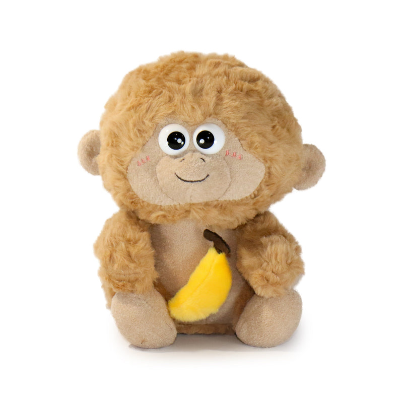 Plush monkey toy holding a banana on a white background