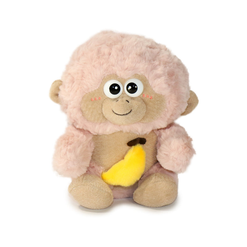 Plush monkey toy with pink outfit and banana on a white background