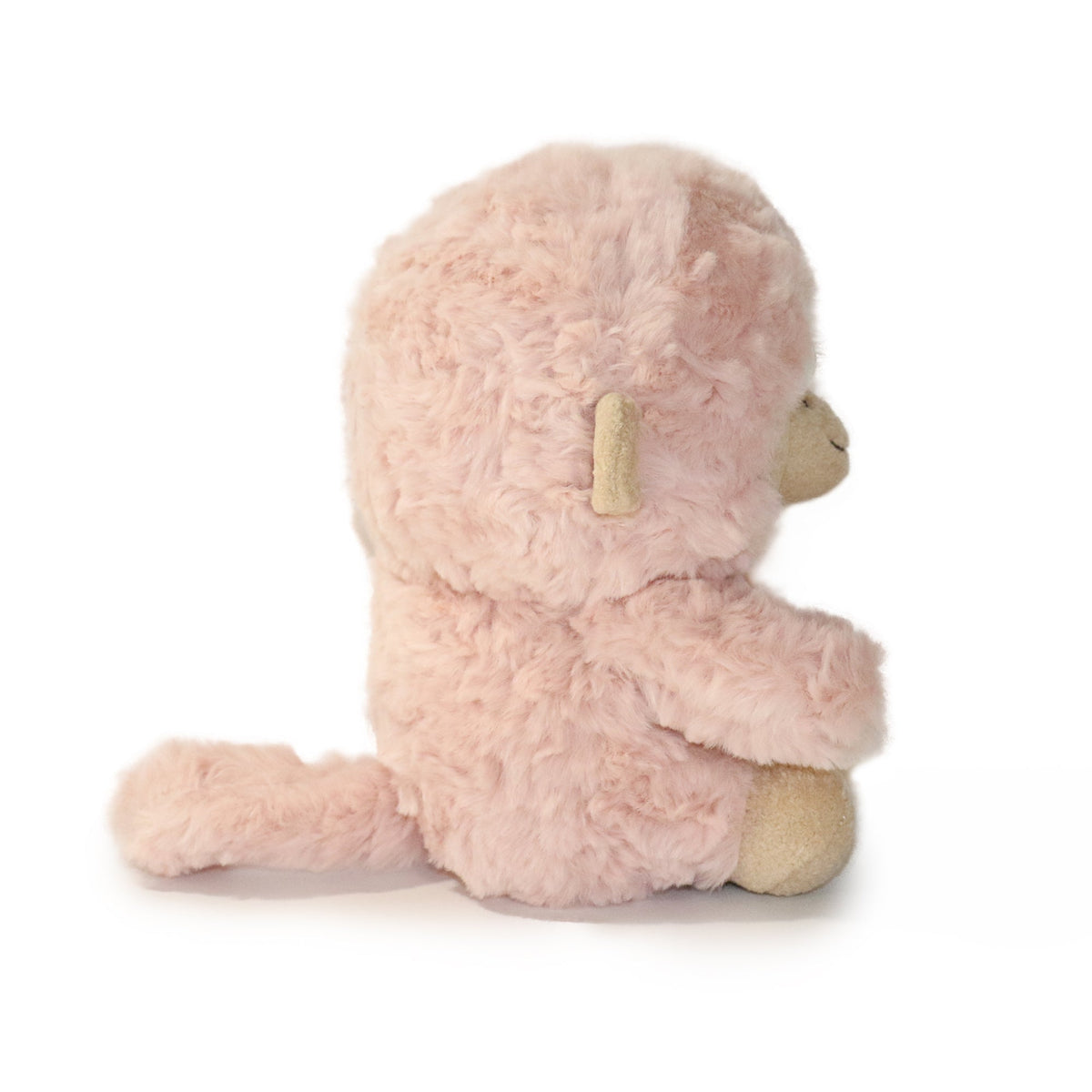 Pink plush toy on a white background
