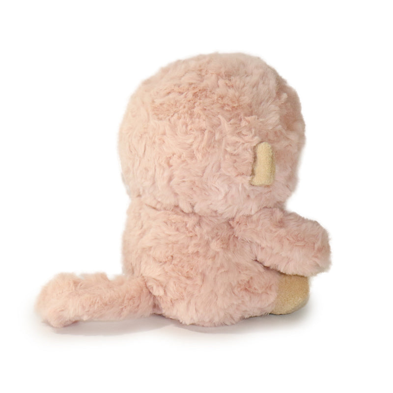 Pink plush toy on a white background
