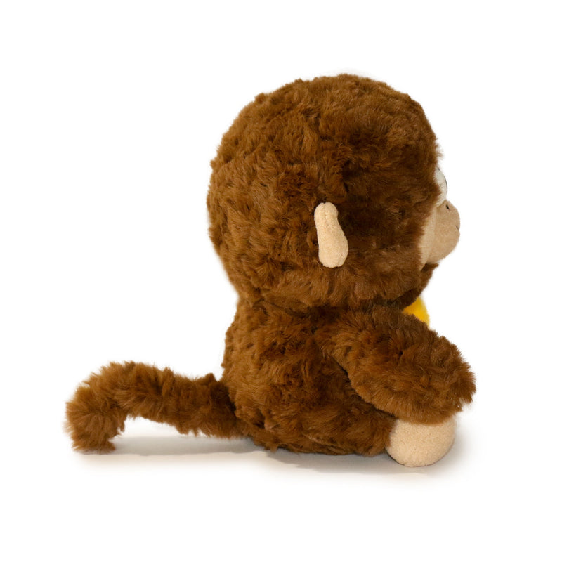 Brown plush monkey toy on a white background