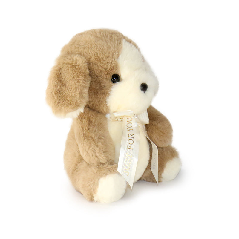 Plush dog toy with a white ribbon on a white background