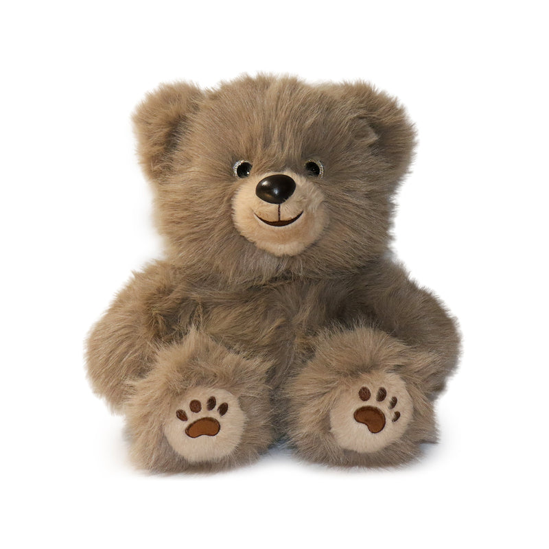 Plush teddy bear with paw prints on a white background