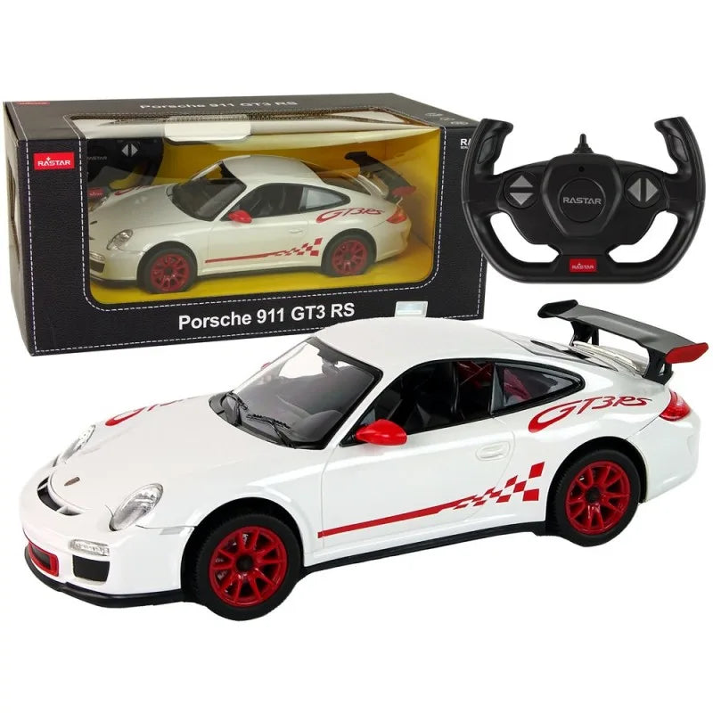 White Porsche 911 GT3 RS model car with red accents, remote control, and packaging on a white background