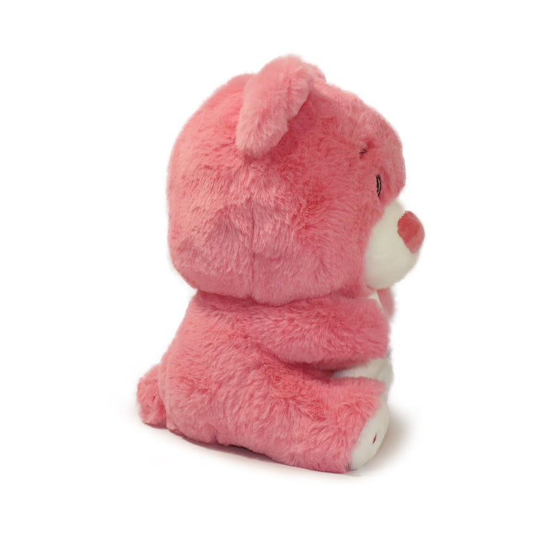 Pink plush bear toy on a white background