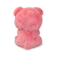 Pink teddy bear on a white background