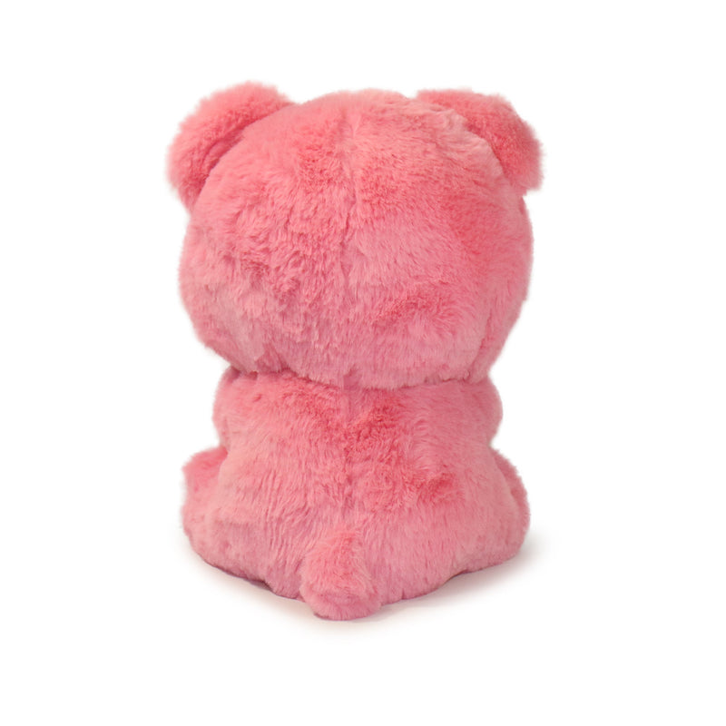 Pink teddy bear on a white background