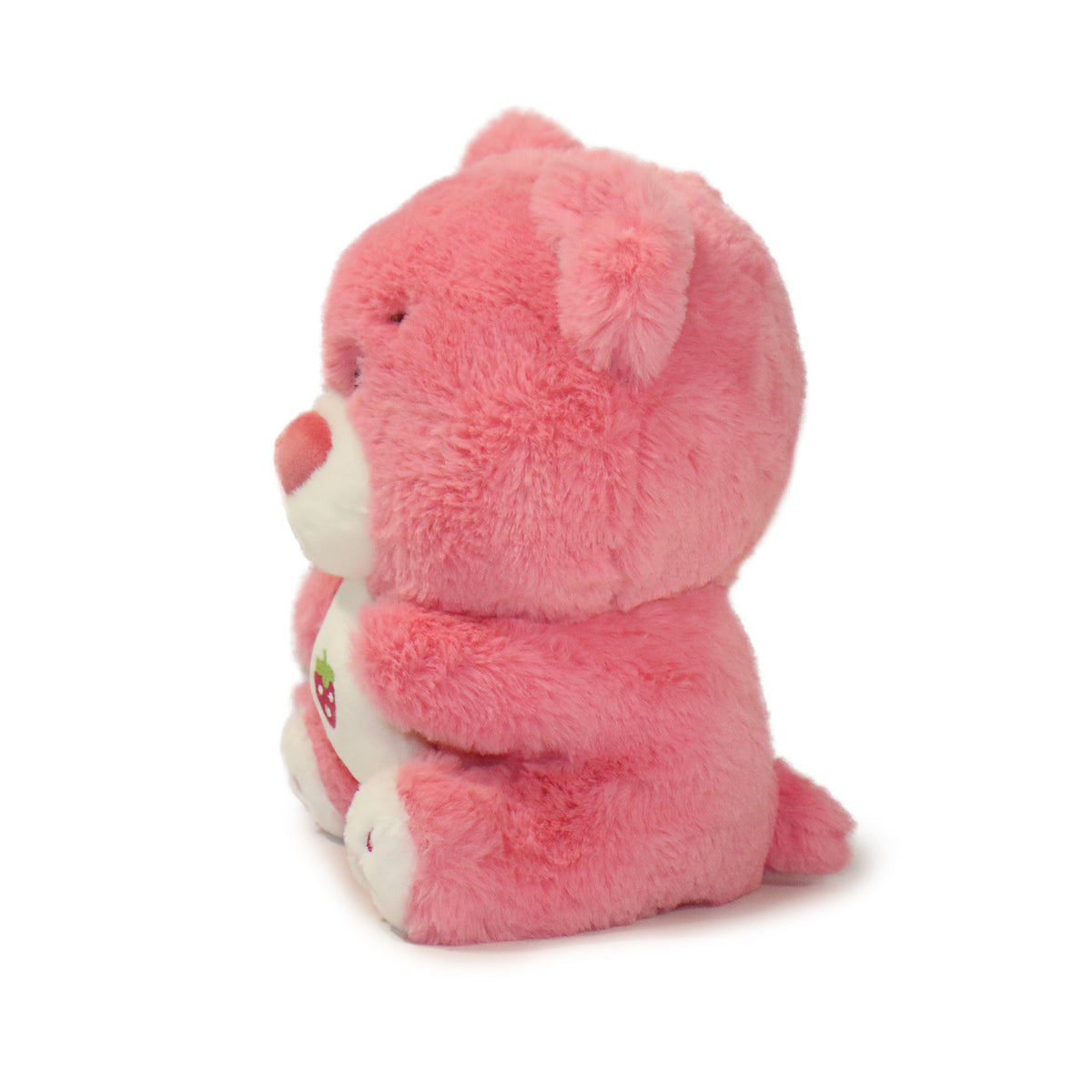 Pink plush bear toy on a white background