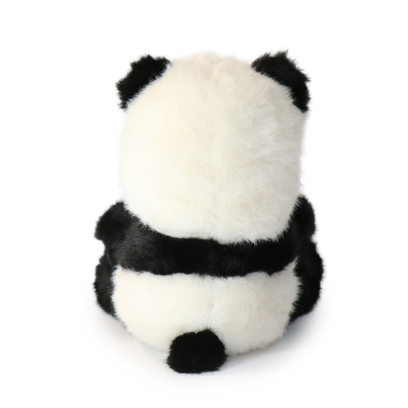 Plush panda toy on a white background