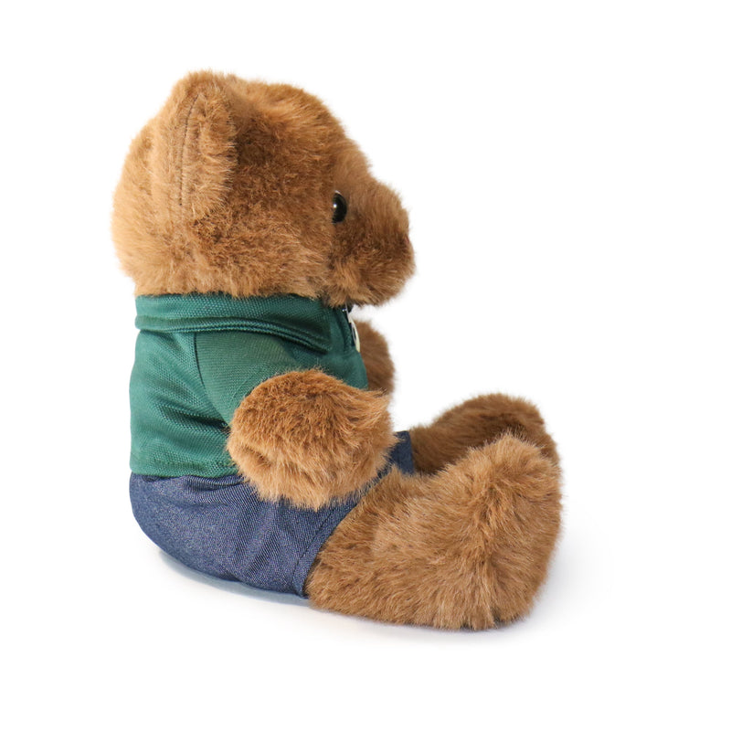 Plush toy squirrel wearing a green shirt and blue pants on a white background
